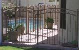 arched decorative pool fencing - tan