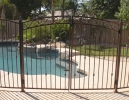 arched double pool gates - natural rust
