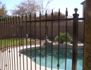 safety ball spears on this decorative pool fence